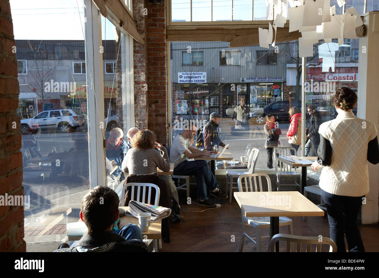 Patrons customers in restaurant diner coffee shop, Vancouver, BC