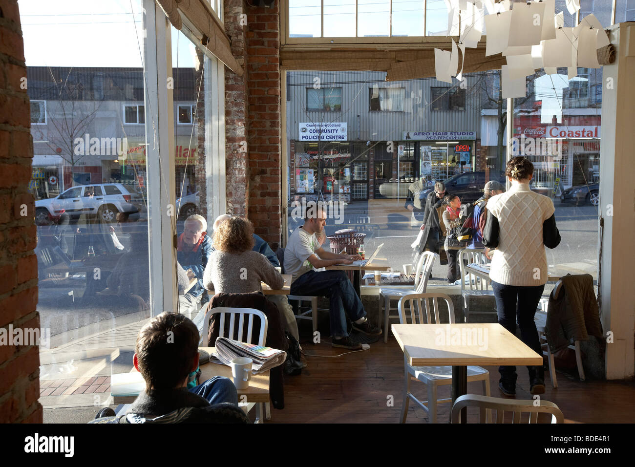 Patrons customers in restaurant diner coffee shop, Vancouver, BC