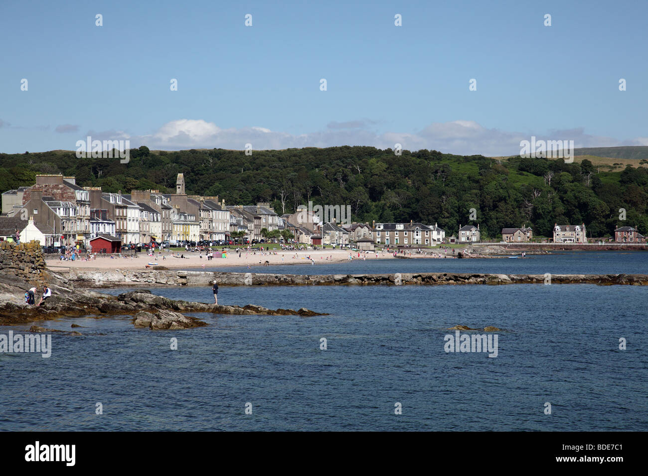Looking across Newton Bay to Newton Beach in the town of Millport on the Island of Great Cumbrae in the Firth of Clyde, North Ayrshire, Scotland, UK Stock Photo