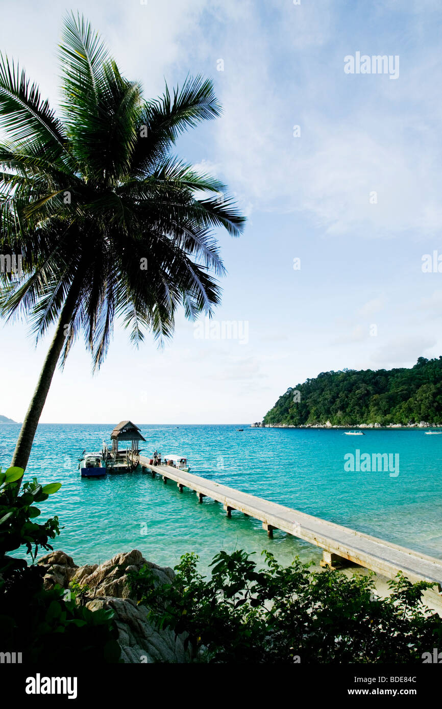 A pier leads to a paradise beach in Pulau Perhentian, Malaysia. Stock Photo