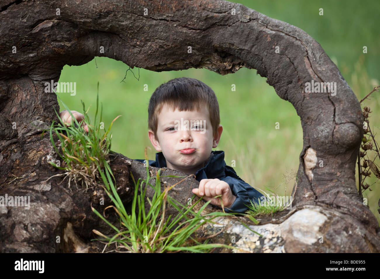 Expressions on a young four years old boys face..happy Stock Photo