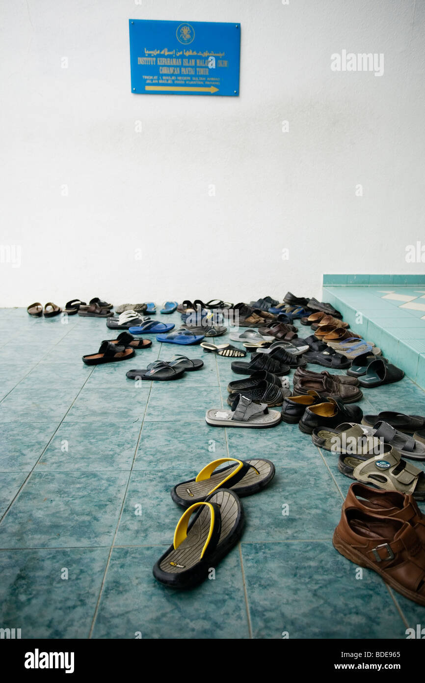 Shoes outside a mosque hires stock photography and images Alamy