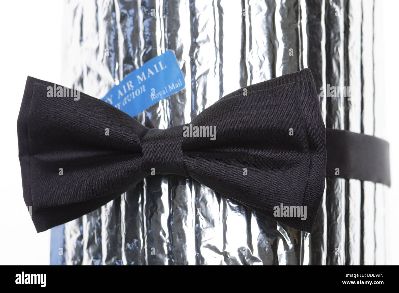 a black bow-tie with label air mail Stock Photo