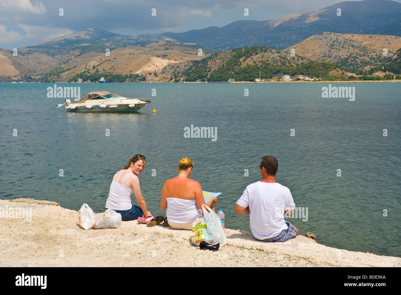 Tourists on the quayside in Argostoli on the Greek Mediterranean island of Kefalonia Greece GR Stock Photo