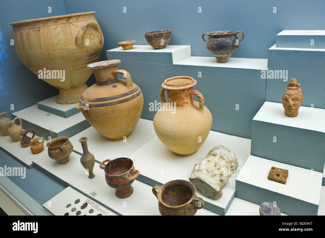 Display case with ancient pottery in the Archaeological Museum at Argostoli on the Greek island of Kefalonia Greece GR Stock Photo