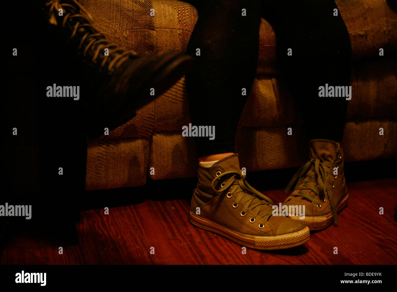 Converse shoes couch hi-res stock photography and images - Alamy