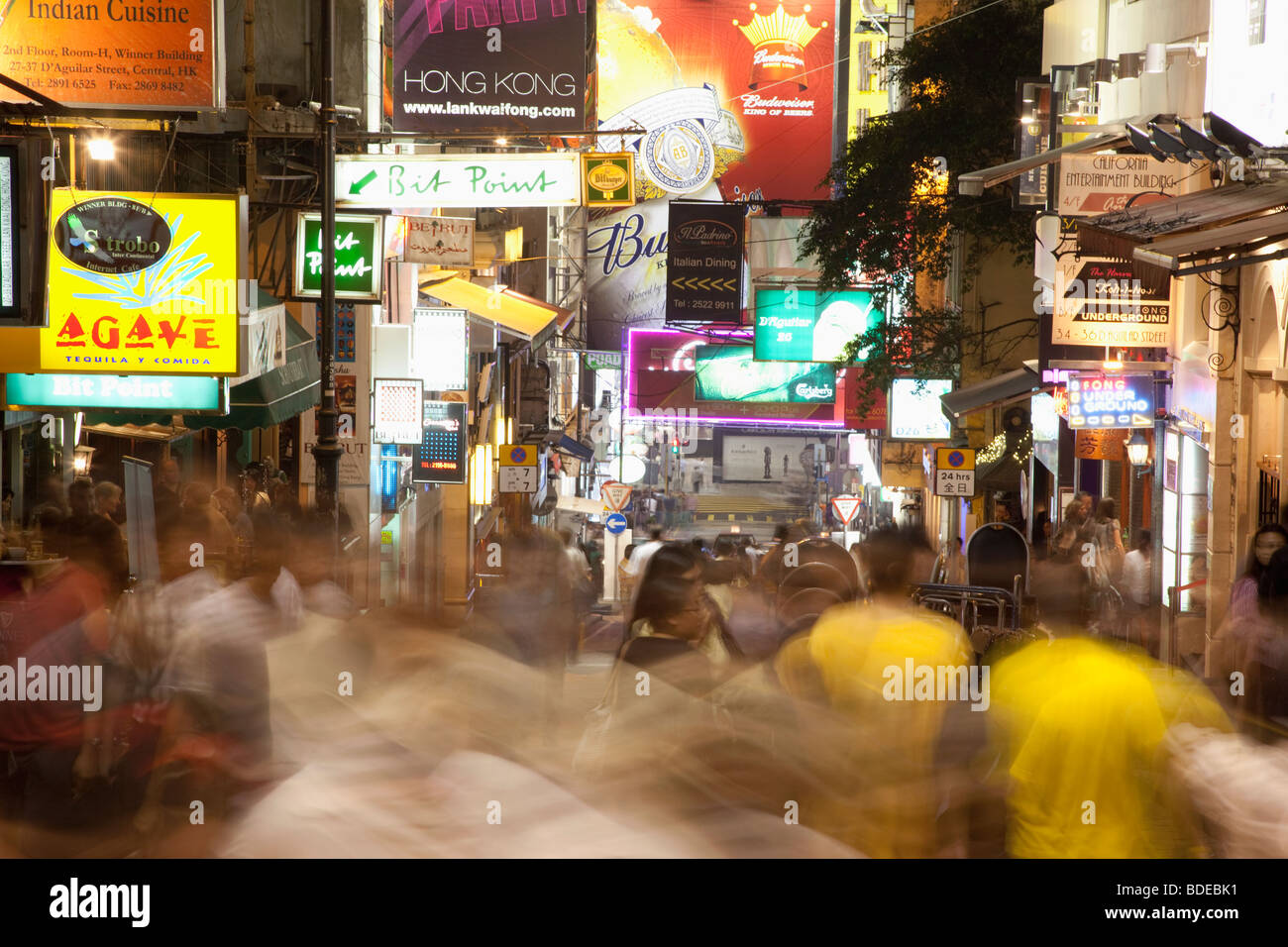 Neon signs and people in Lan Kwai Fong, Hong Kong, China. Stock Photo