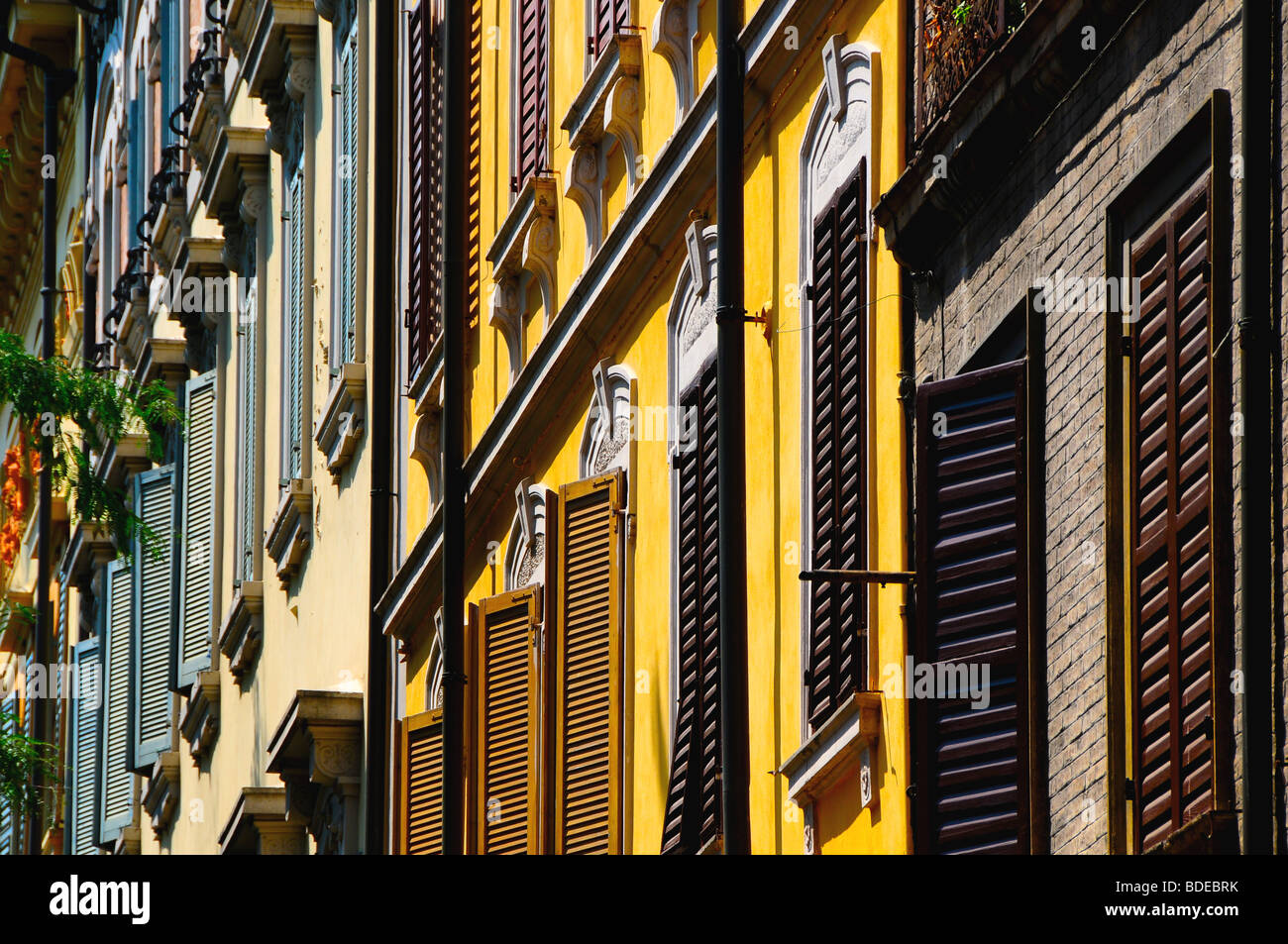 Wooden shutters on buildings in Modena, Italy Stock Photo