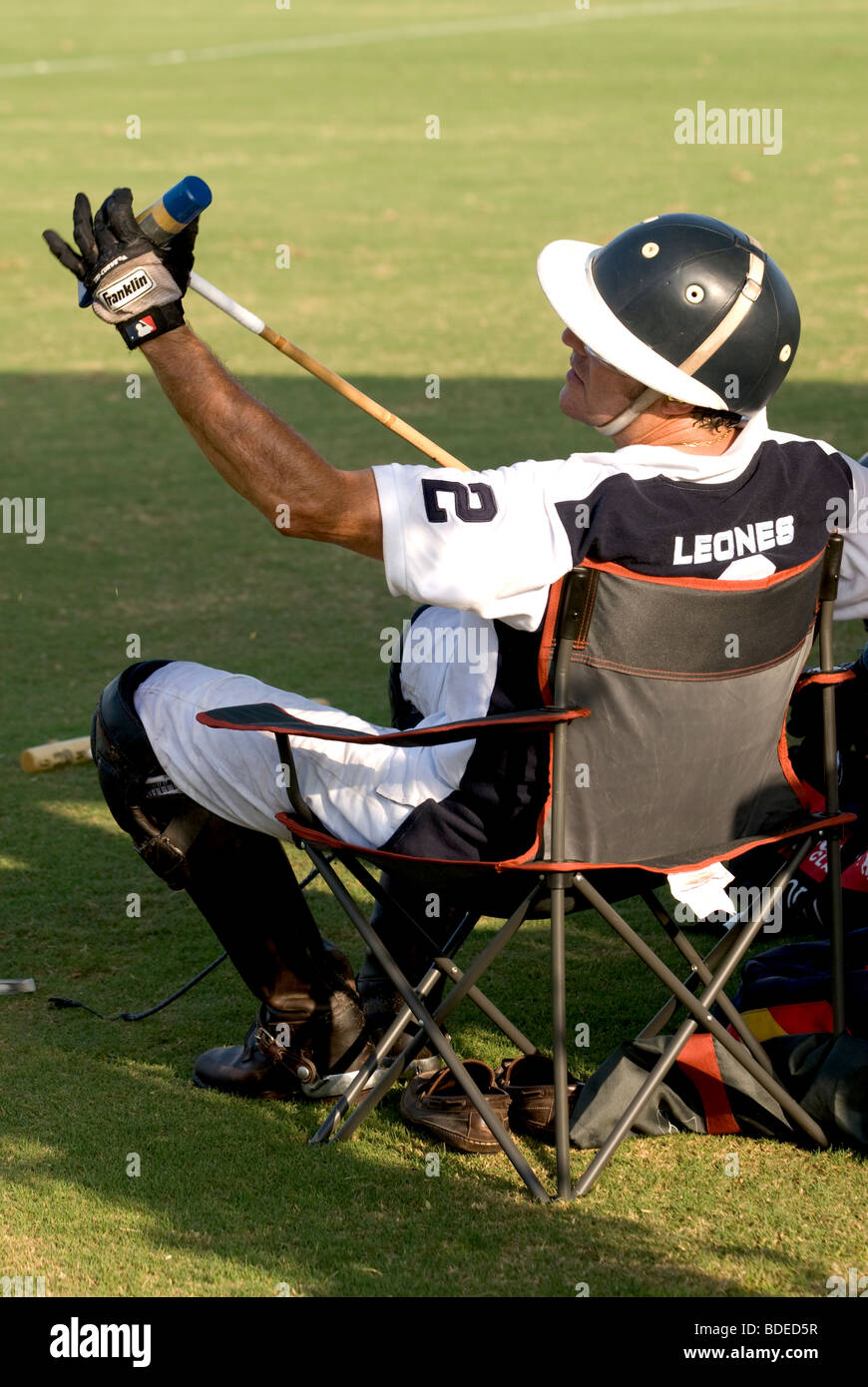 Polo players before game checking polo stick Stock Photo Alamy