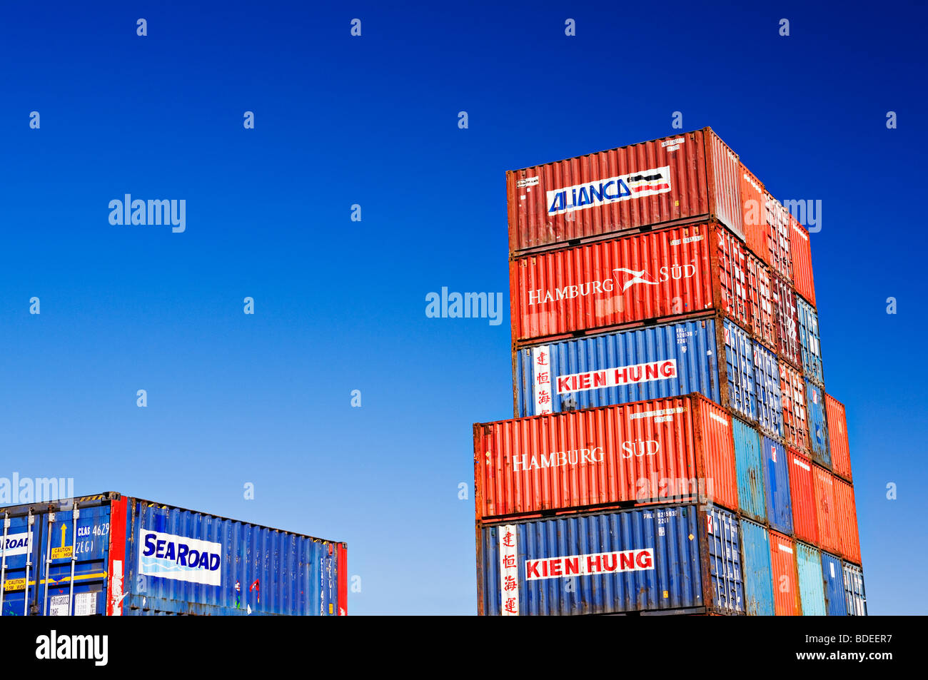 Shipping Industry / Shipping containers stacked at a port container terminal.The "Port of