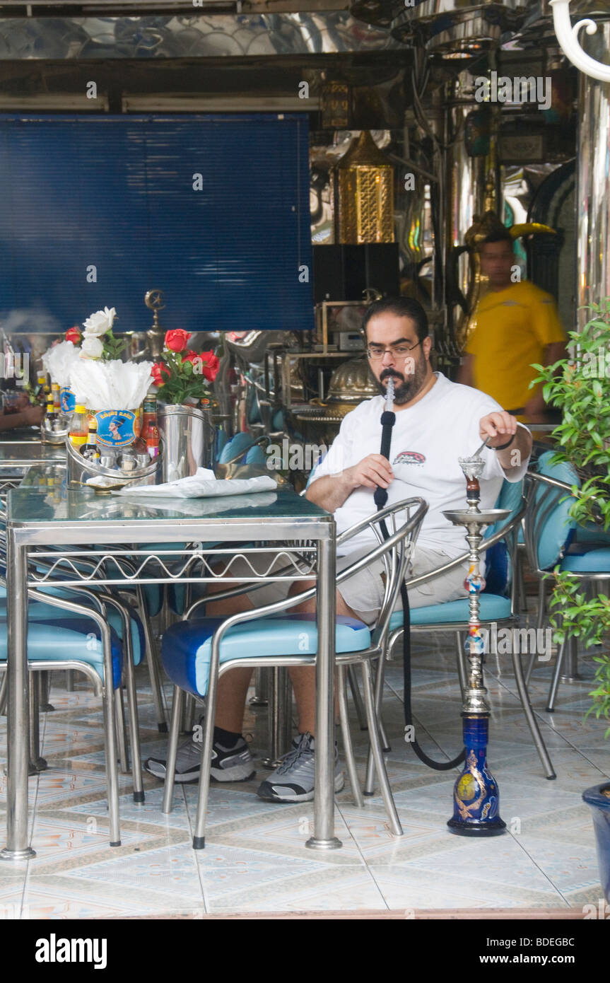 smoking a sheesha water pipe in Little Arabia in Bangkok Thailand Stock