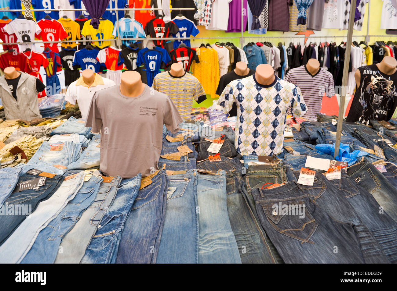 Clothing for sale on stall annual festival market at St Gerasimos Monastery  on the Greek island of Kefalonia Greece GR Stock Photo - Alamy