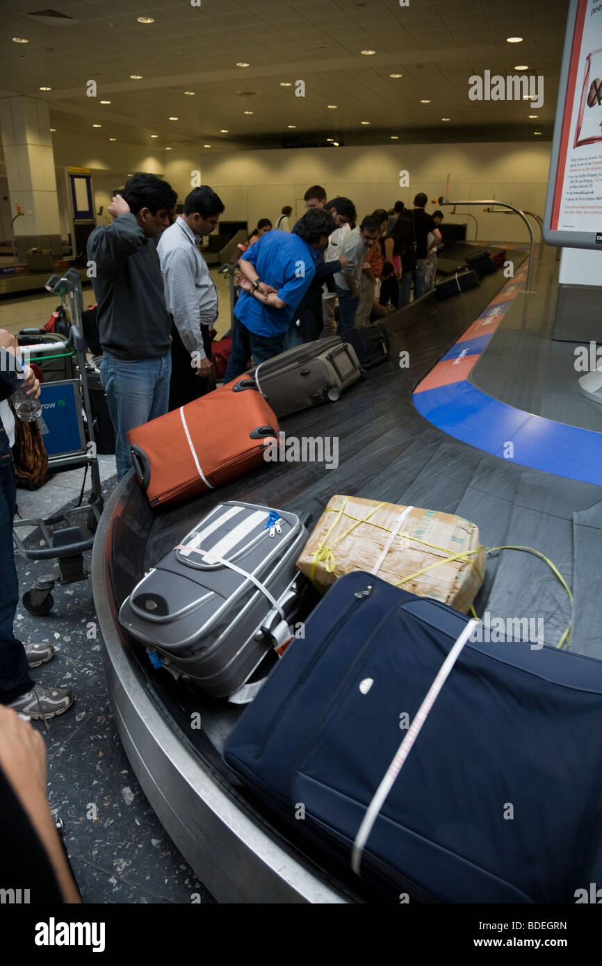 Luggage baggage reclaim carousel belt at south terminal Gatwick
