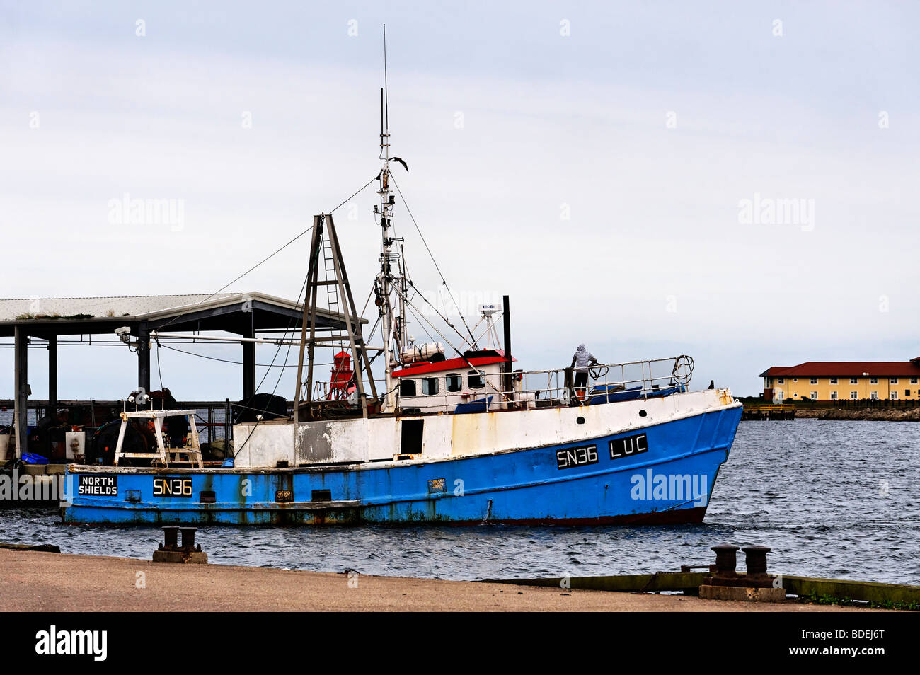 Trawler leaving harbour on the River Tyne at Fish Quay, North Shields Stock Photo