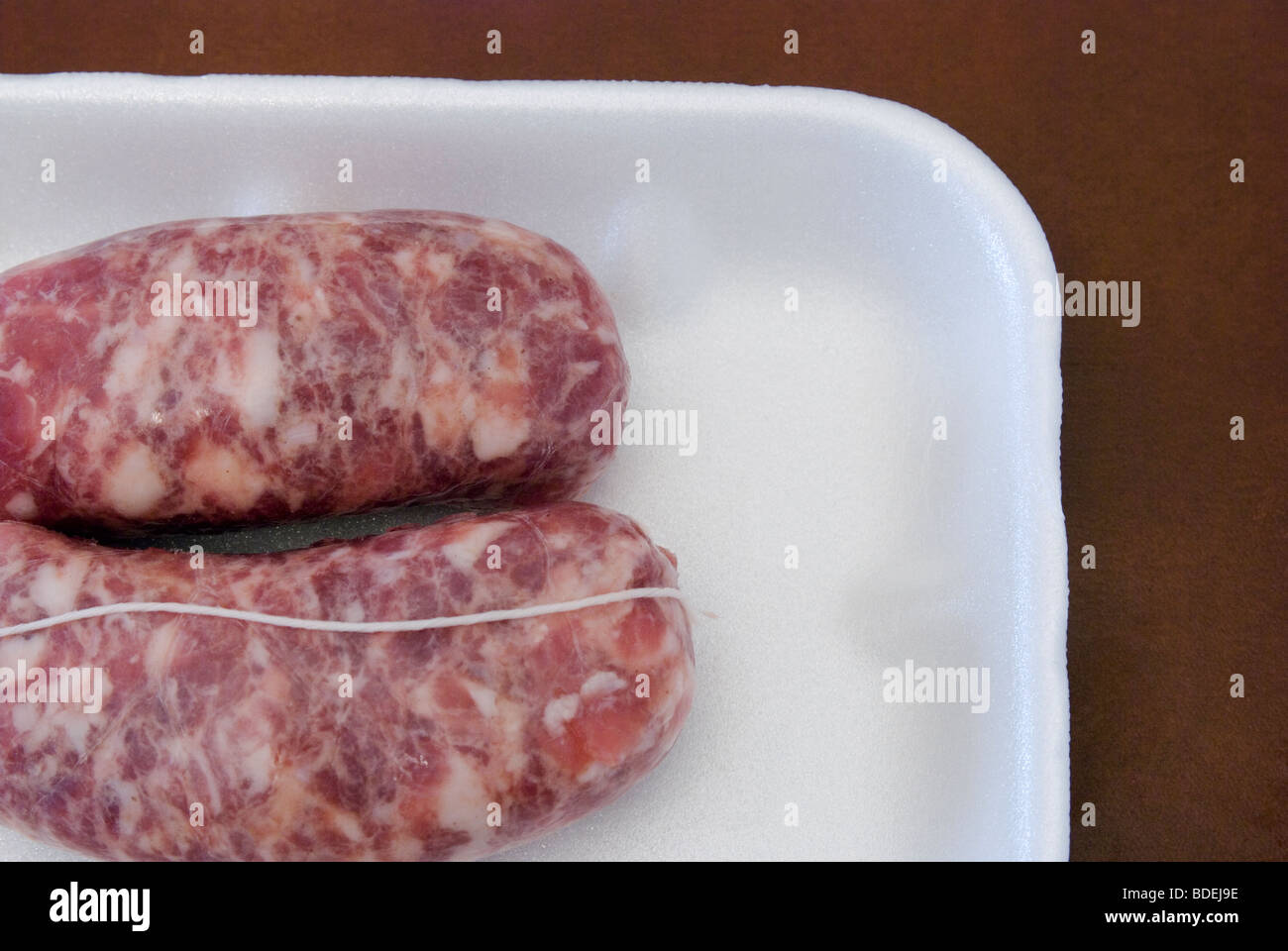 salsiccie, fresh italian sausages in box Stock Photo