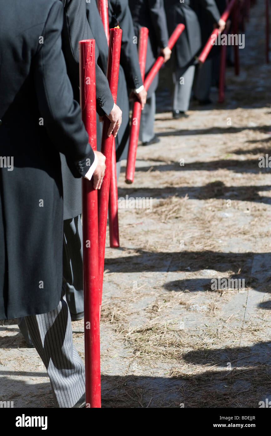 Brotherhood members bearing candles. Corpus Christi procession, Seville