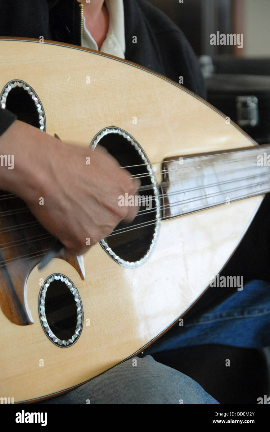 Israel, Carmel Mountain, Daliyat al-Karmel a Druze town in the North District, Man plays an Ud - Lute Stock Photo