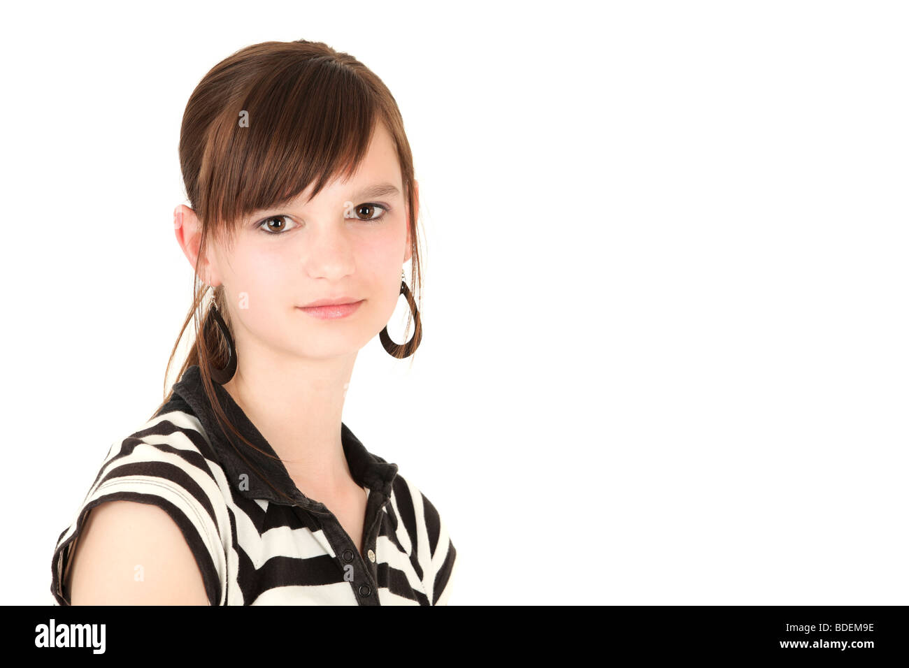 Portrait of teenage girl against white background Stock Photo - Alamy