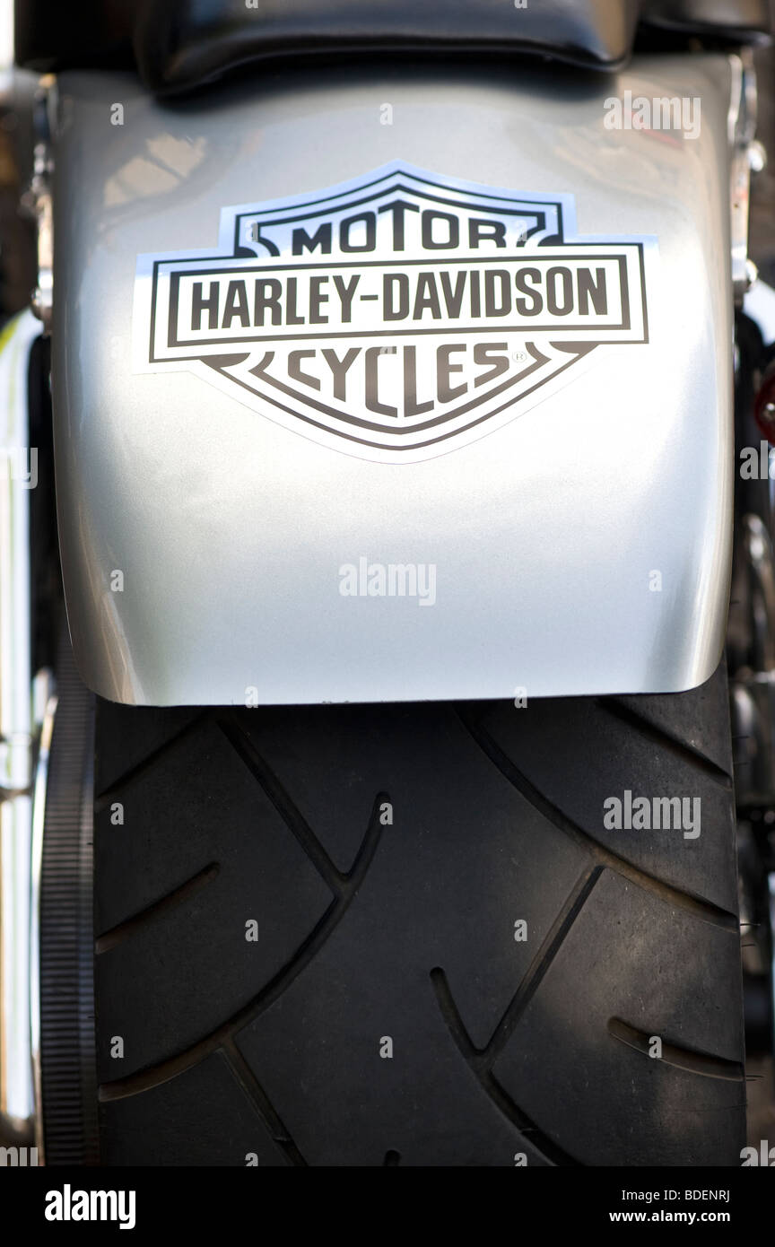 Harley Davidson motorcycles badge on a custom bikes mudguard with huge back tyre Stock Photo