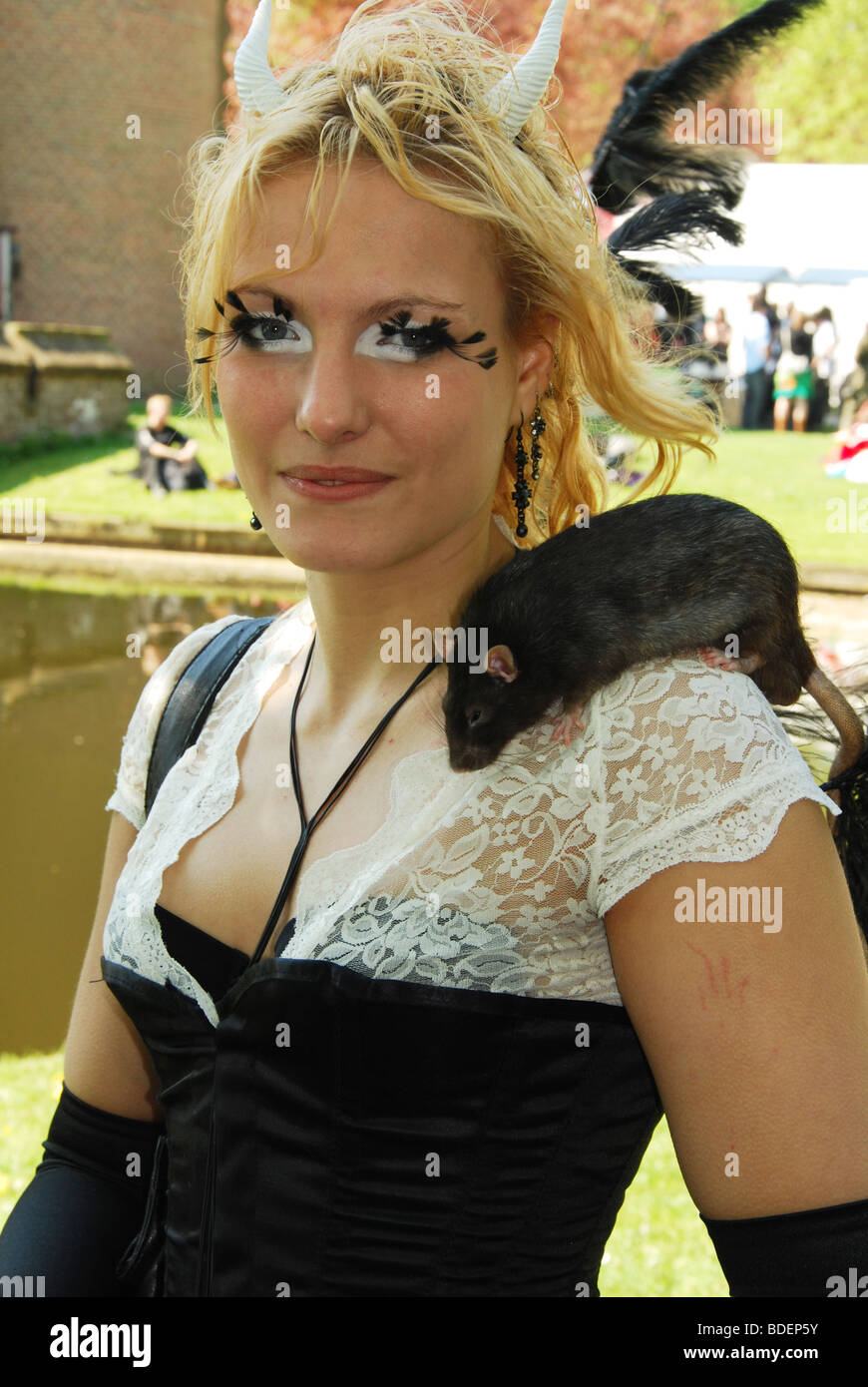 girl with rat posing at 2009 Fantasy Fair Haarzuilens Netherlands Europe Stock Photo