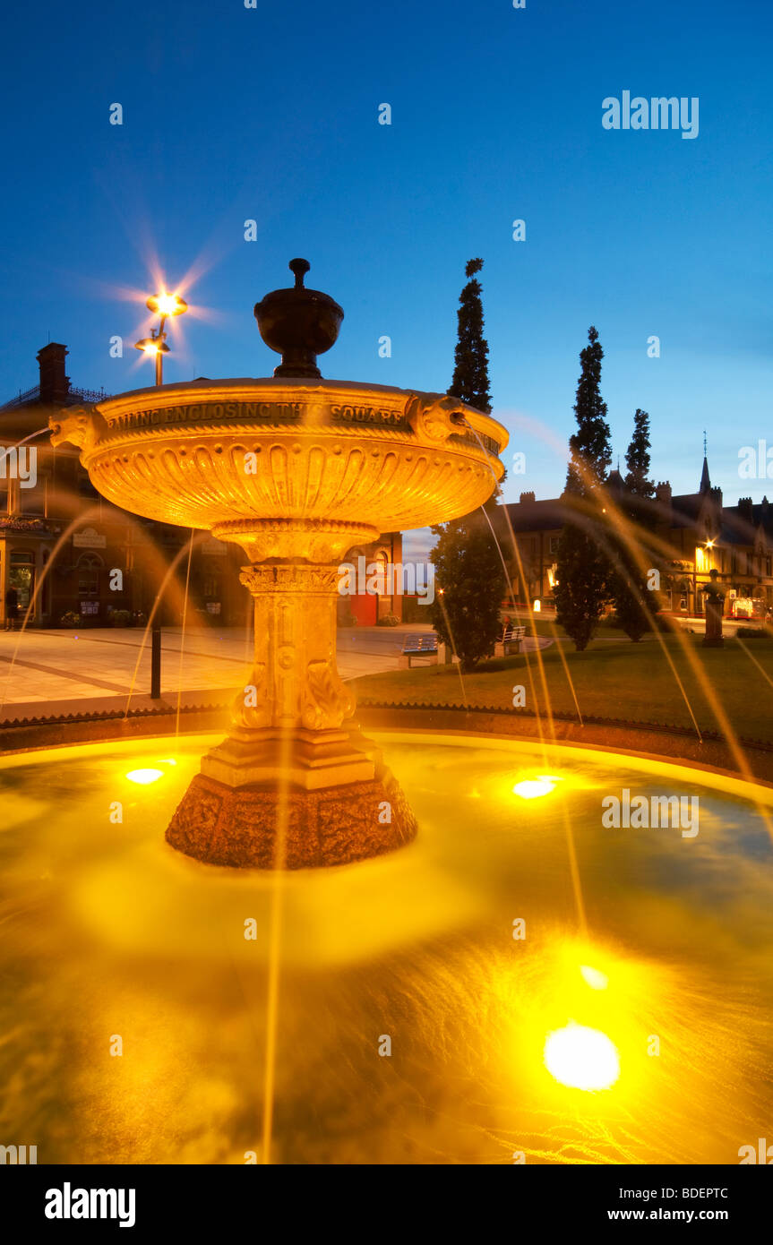 Illuminated water fountain in the new square in Barnstaple at dusk