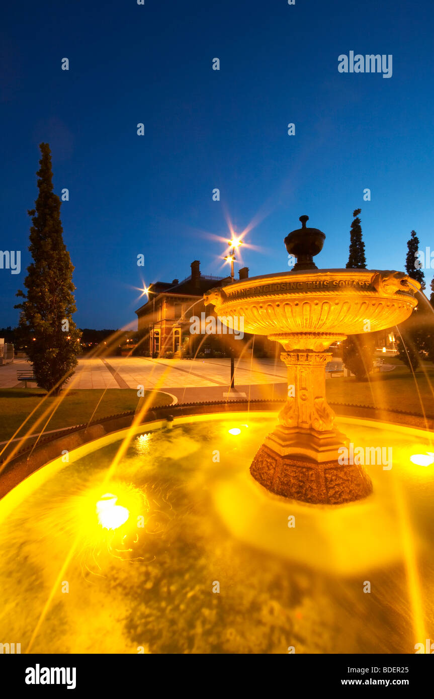 Illuminated water fountain in the new square in Barnstaple at dusk
