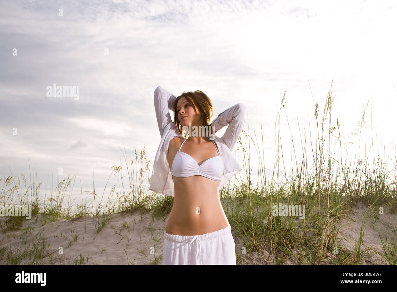 Woman in grass skirt bikini hi-res stock photography and images - Alamy