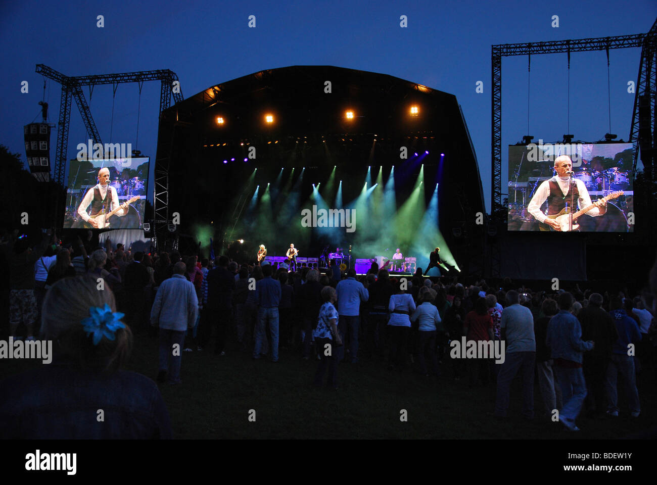 stage and video screens at Glastonbury Extravaganza 2009, with Status Quo on stage Stock Photo