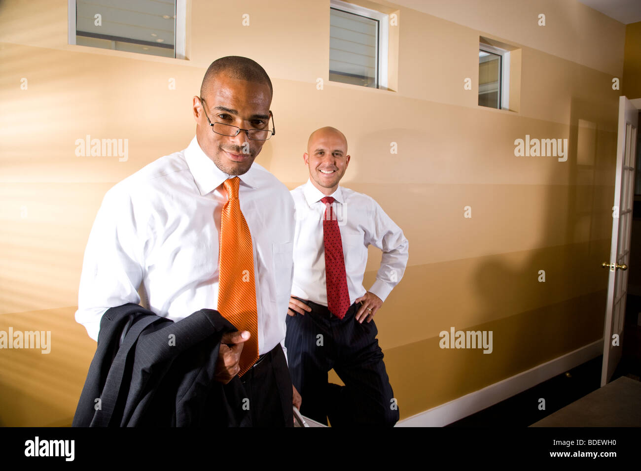 Two businessmen in office boardroom Stock Photo - Alamy