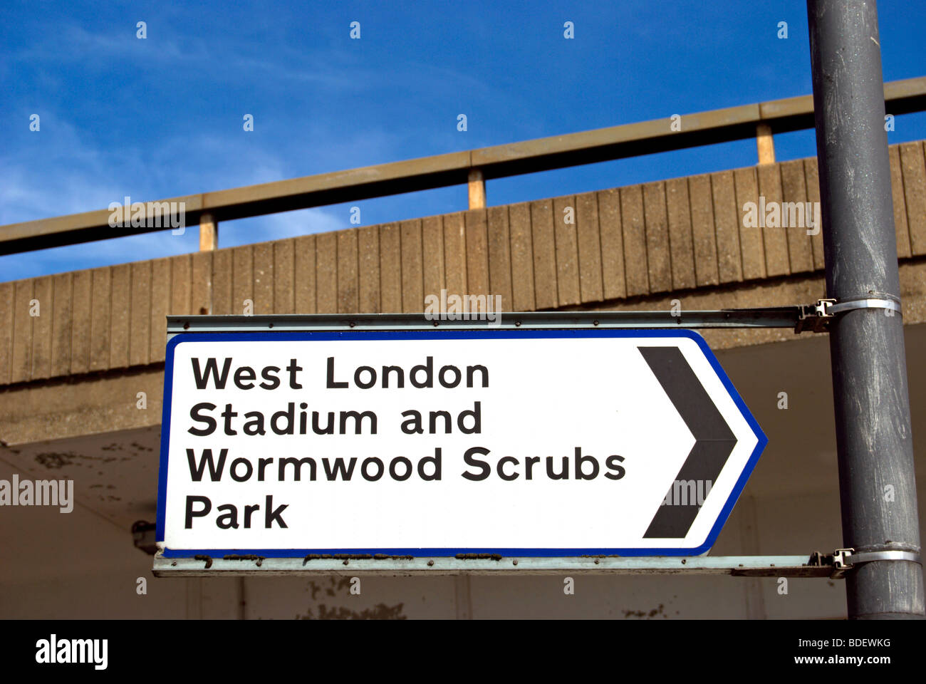 british road sign giving directions for west london stadium, since ...