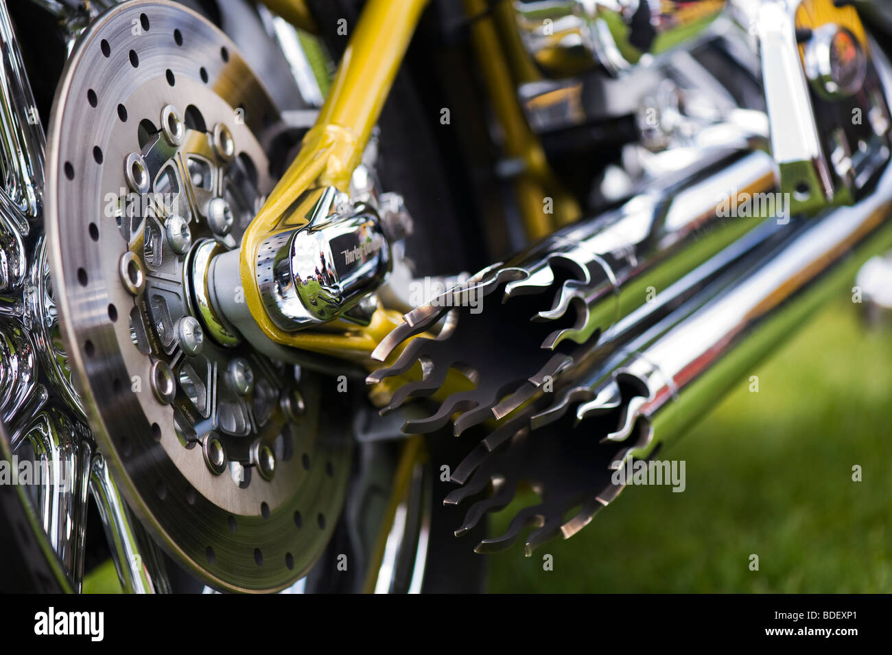 Harley Davidson motorcycle chrome flame exhaust pipes Stock Photo - Alamy