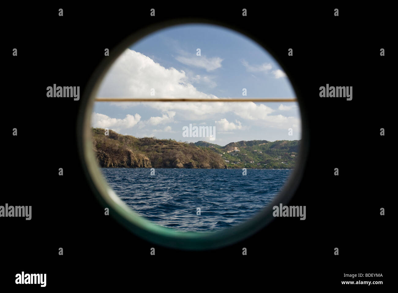 Sailboat porthole view of  the Golfo of Papagayo Bay in Guanacaste, Costa Rica. Stock Photo