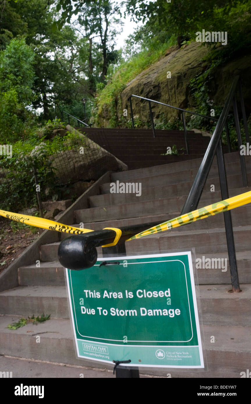 a sign indicating Central Park is closed due to storm damage Stock