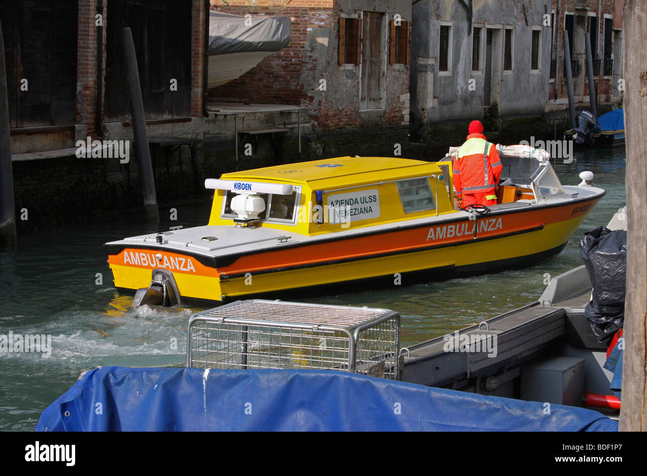 Venitian boat ambulance, yellow and orange, Calle Larga Giacinto Gallina Venezia Veneto Italia 92341-Venice Stock Photo