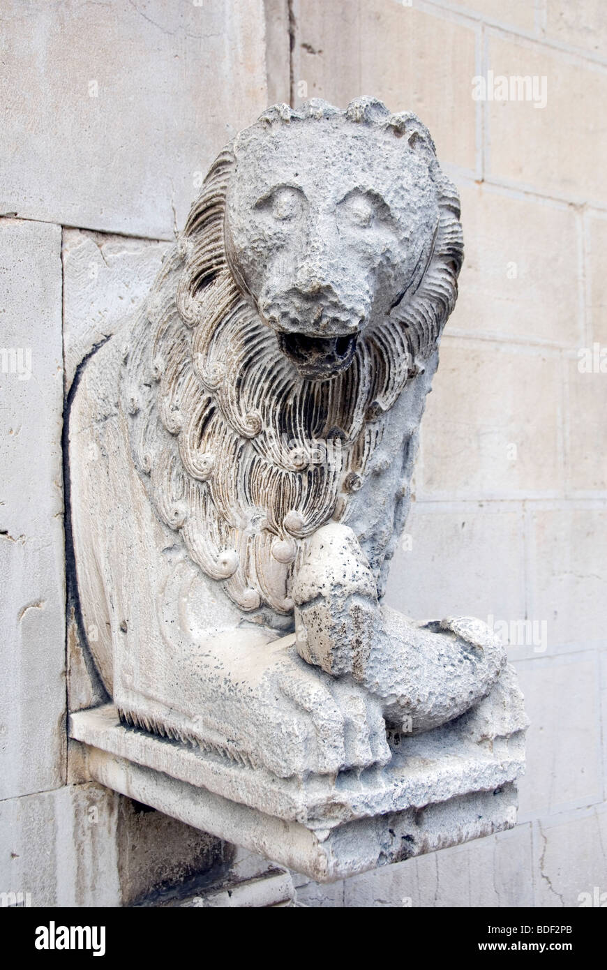 Ancient carving of lion on the Romanesque Duomo (cathedral) of Visso in Le Marche Stock Photo