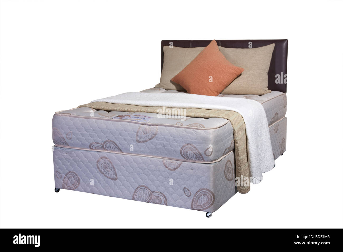 Studio shot cut out of double divan mattress and base with head board Stock Photo