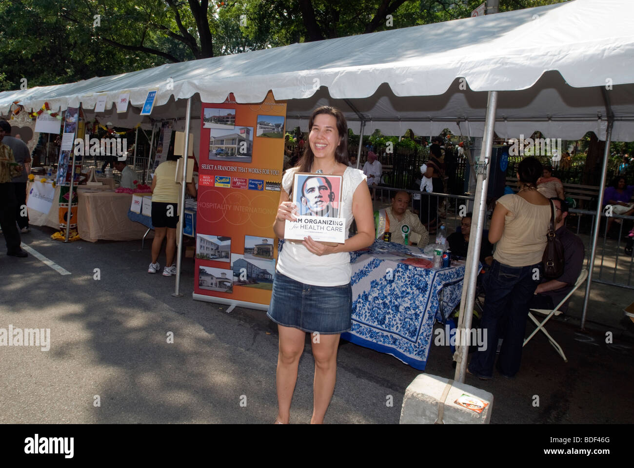 An advocate of the Obama healthcare plan petitions after the Indian Independence Day Parade in New York Stock Photo