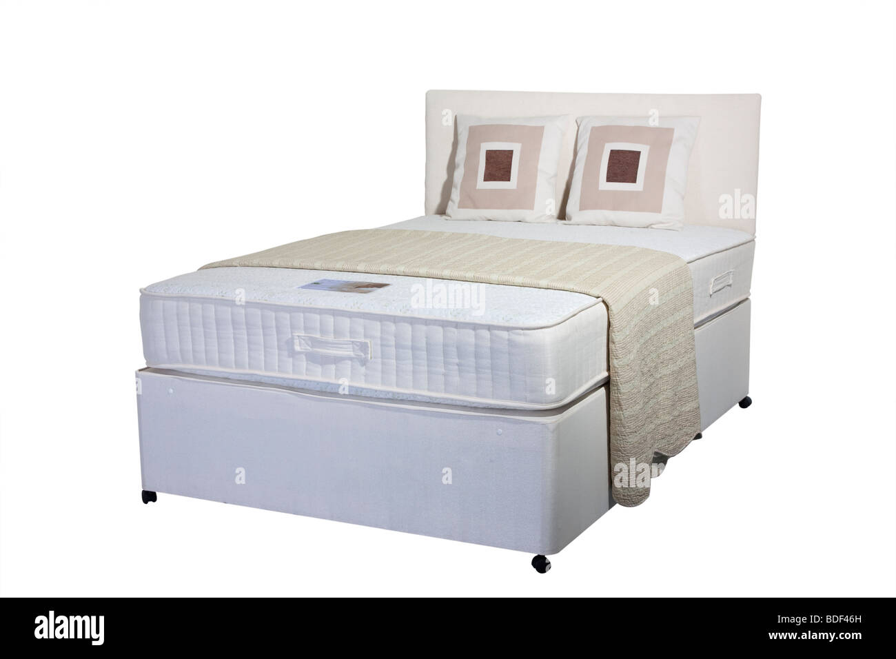 Studio shot cut out of double divan mattress and base with head board Stock Photo