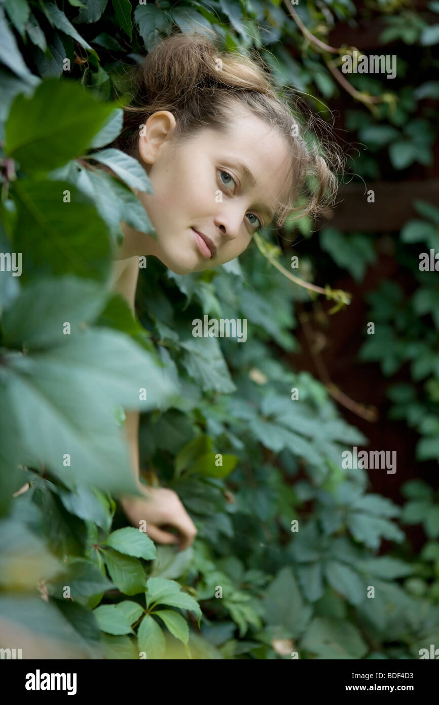 Portrait of young girl in the forest Stock Photo - Alamy