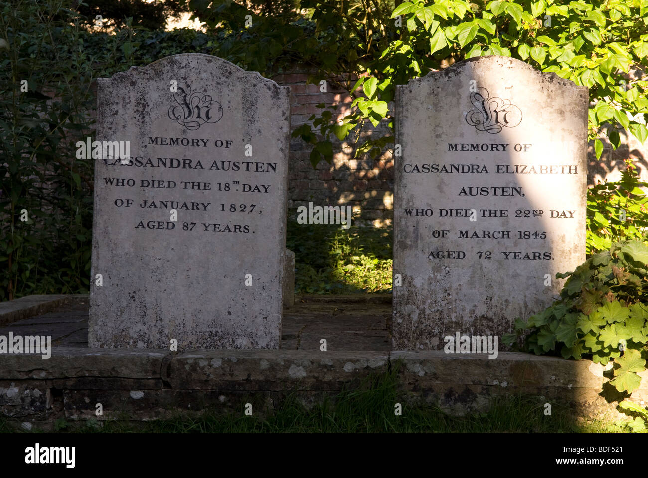 Headstones in St Nicholas Church graveyard of 19th century novelist Jane Austen's mother and sister, Chawton, Hampshire, UK. Stock Photo