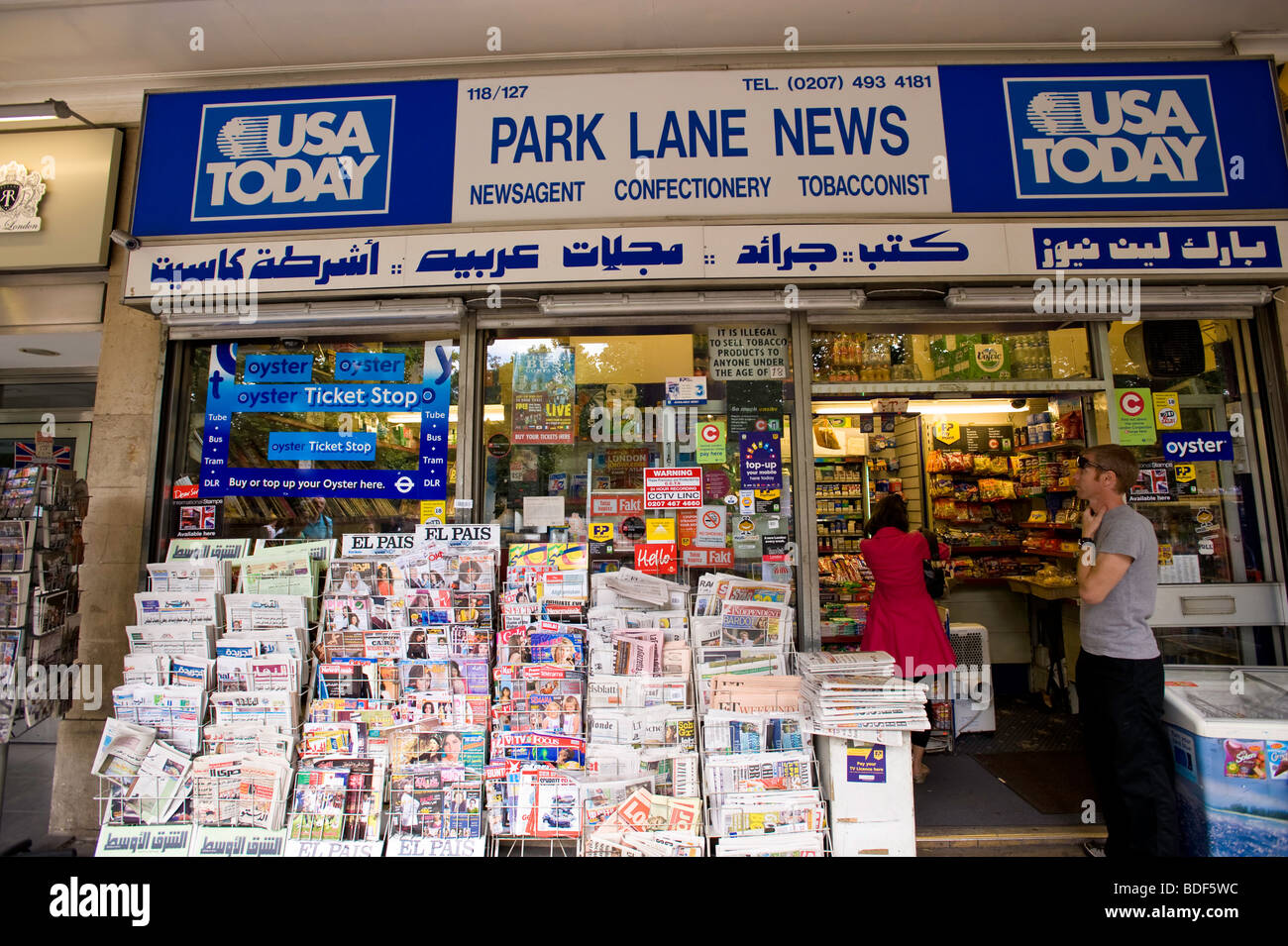 Newsagent kiosk selling Arabic language newspapers, Park Lane, London, United Kingdom Stock Photo