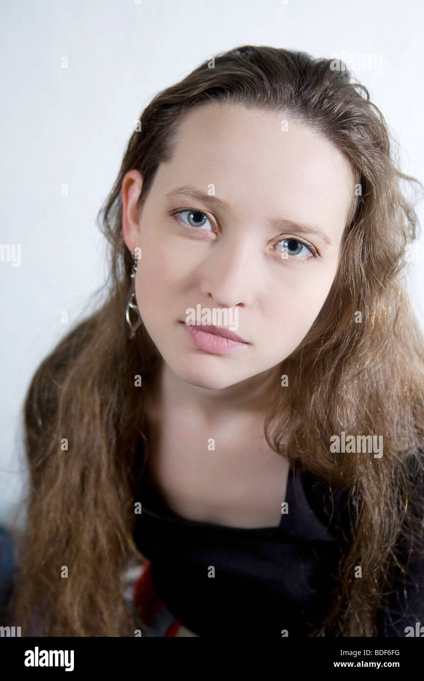 portrait young attractive girl with long hair and blue eyes Stock Photo ...