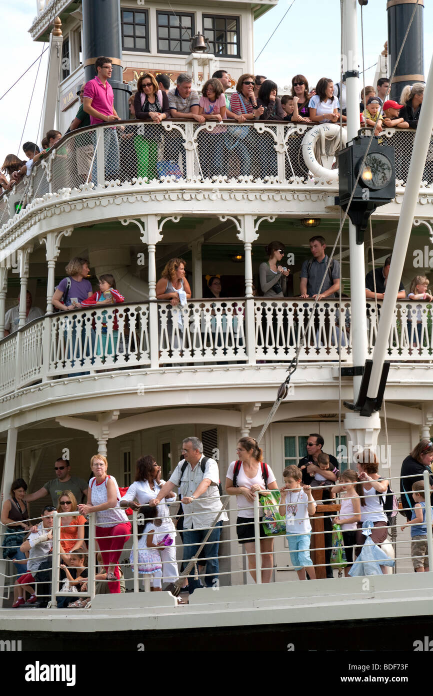 Crowds of tourists on different levels of the steamboat, Disneyland Paris, France Stock Photo