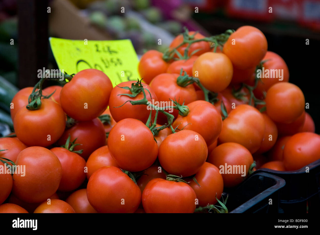 Vine tomatoes on a market stall hi-res stock photography and images - Alamy