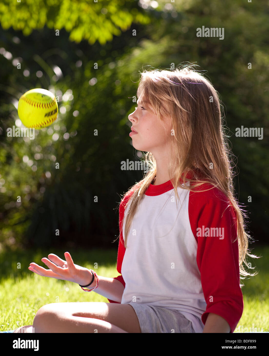 Child tossing ball air hires stock photography and images Alamy