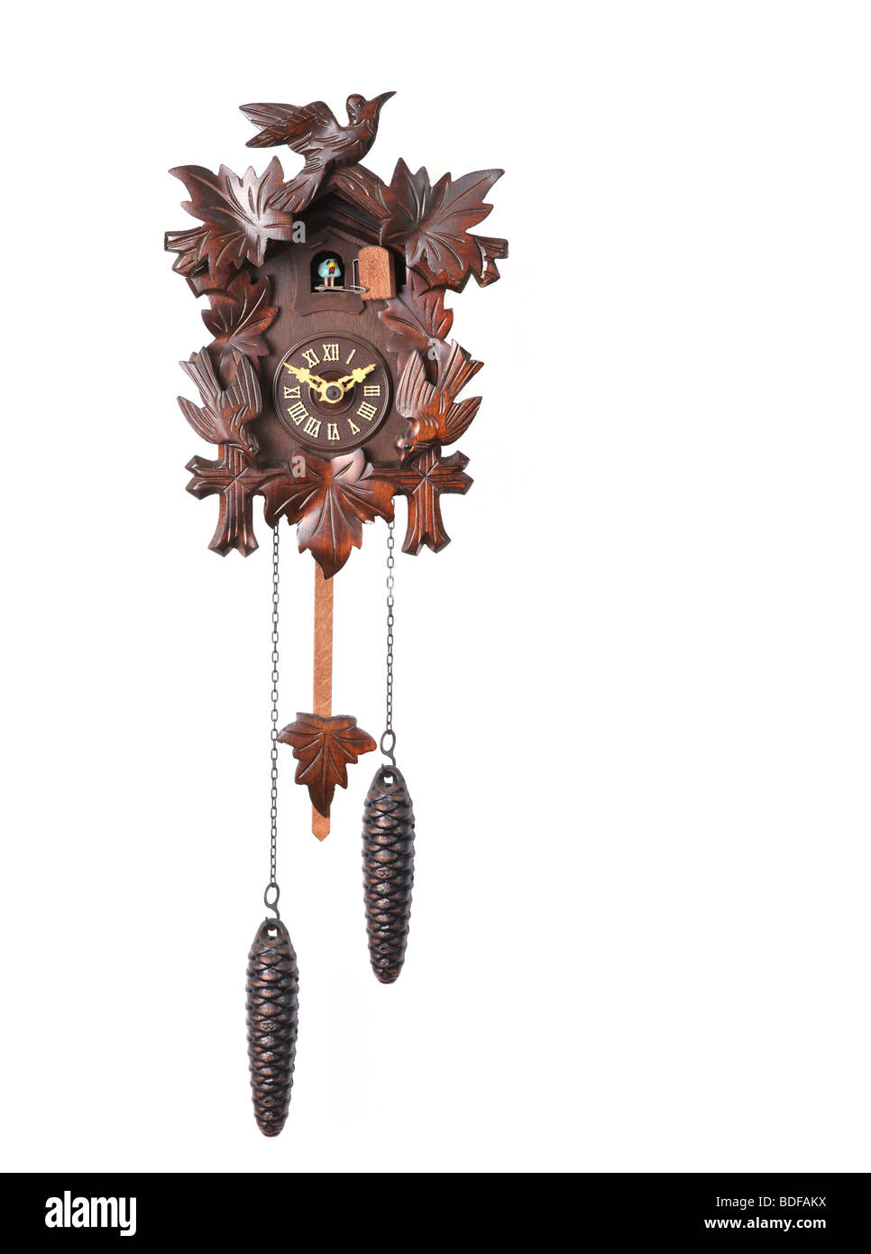 Cuckoo Clock Isolated on a White Background With Hanging Weights Stock