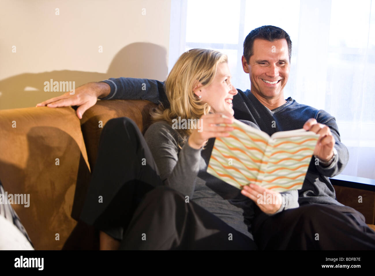 Mid adult couple sharing hi-res stock photography and images - Alamy
