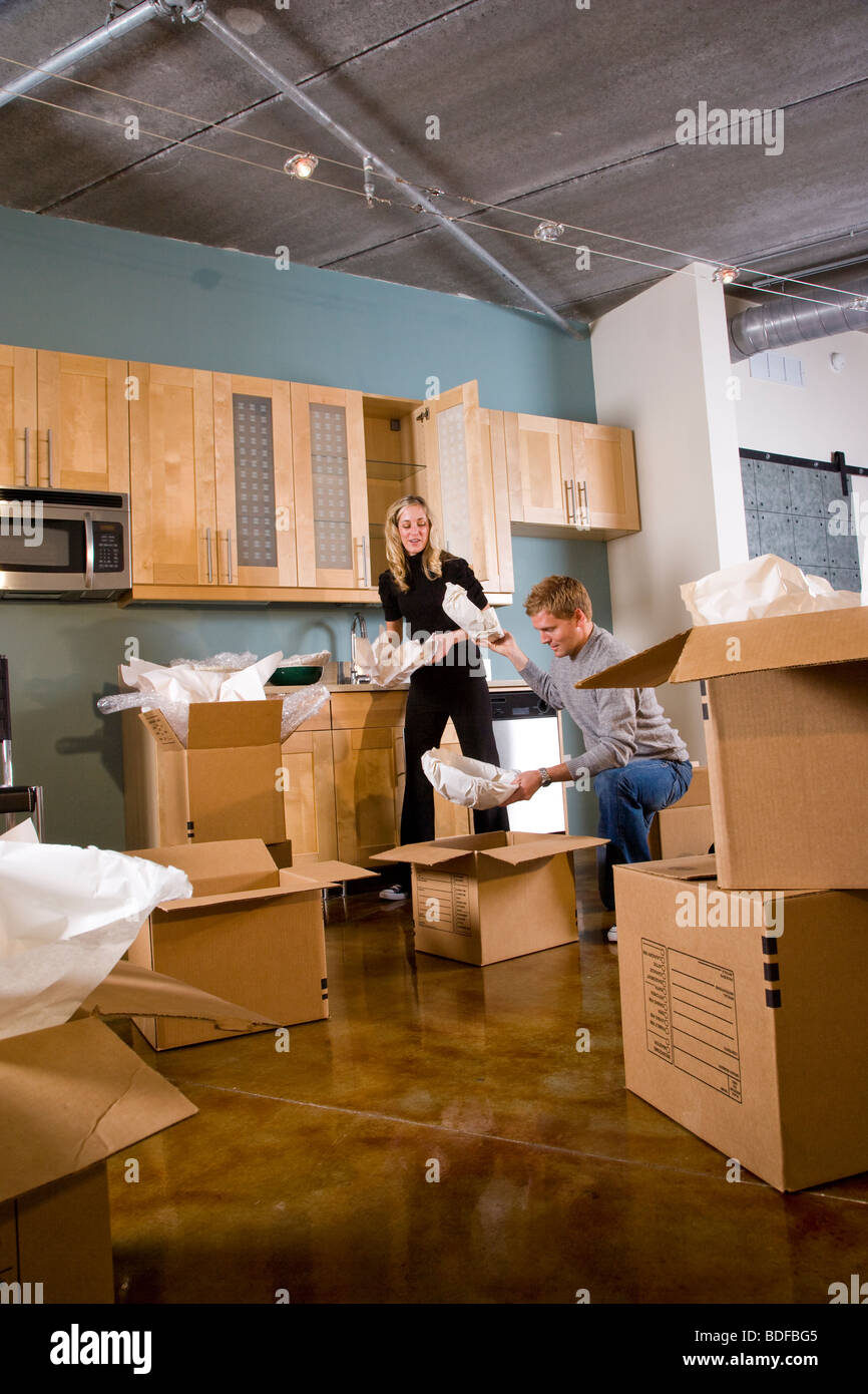 Unpacking dishes hi-res stock photography and images - Alamy