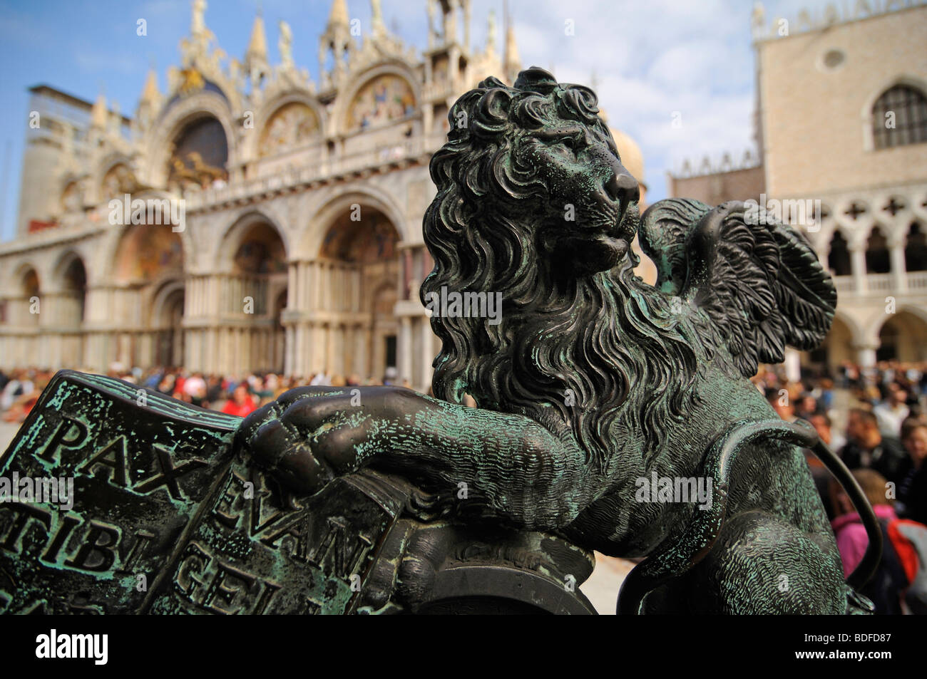 The Lion of Venice, in the back the Basilica of San Marco, Venice, Italy, Europe Stock Photo