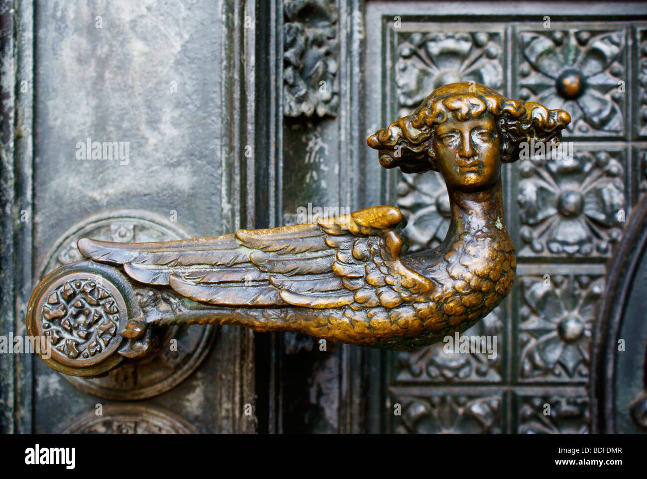 Kölner Dom / Cologne Gothic Cathedral in Germany. Close-up detail of angel door handle. Stock Photo